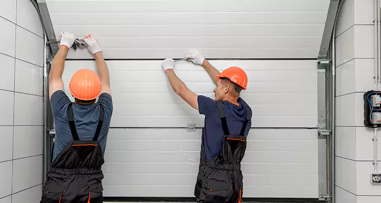 Garage Door Bottom Panel Repair in Ferry Pass, FL
